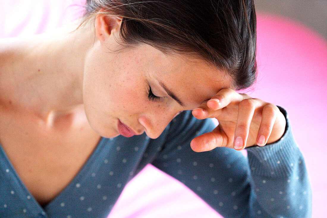 Woman suffering from headache