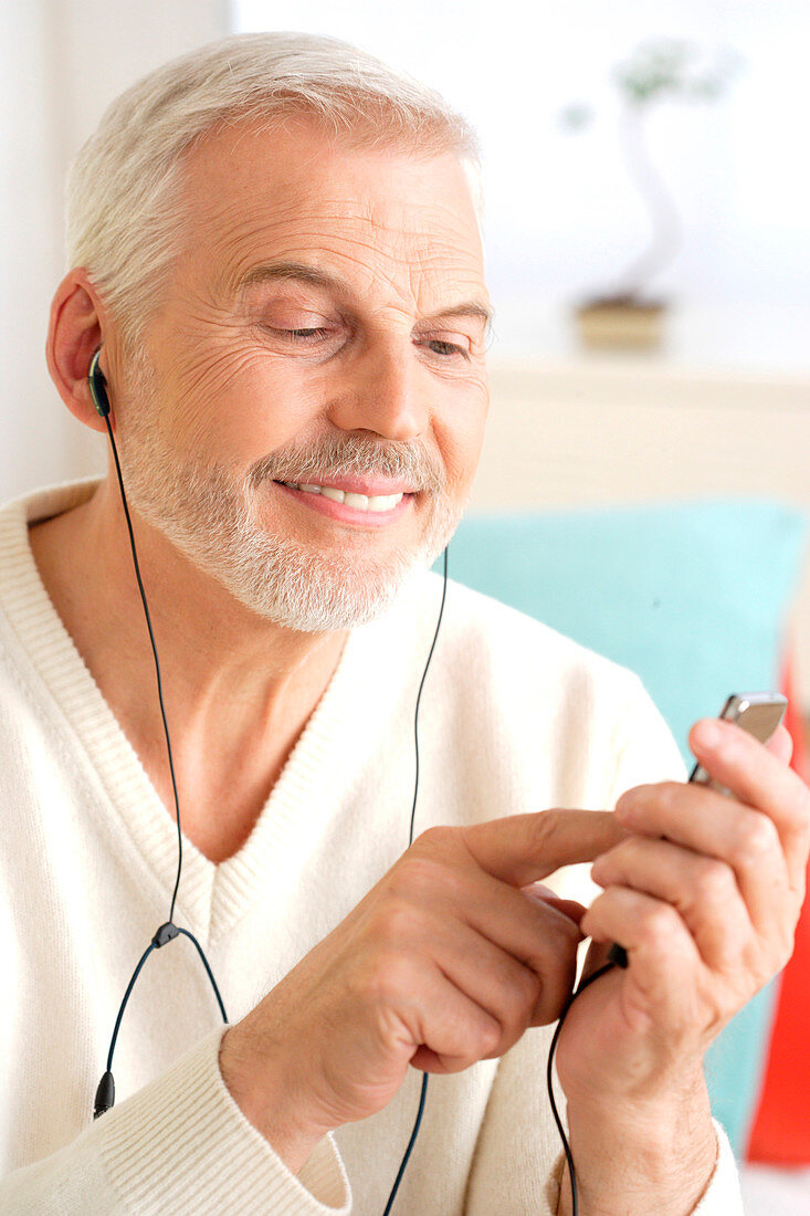 Man listening music with a MP3 player