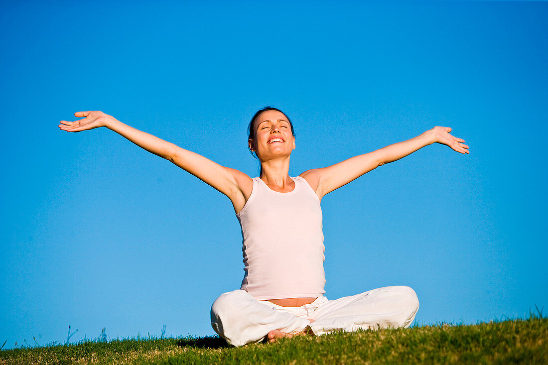 Pregnant woman practising yoga