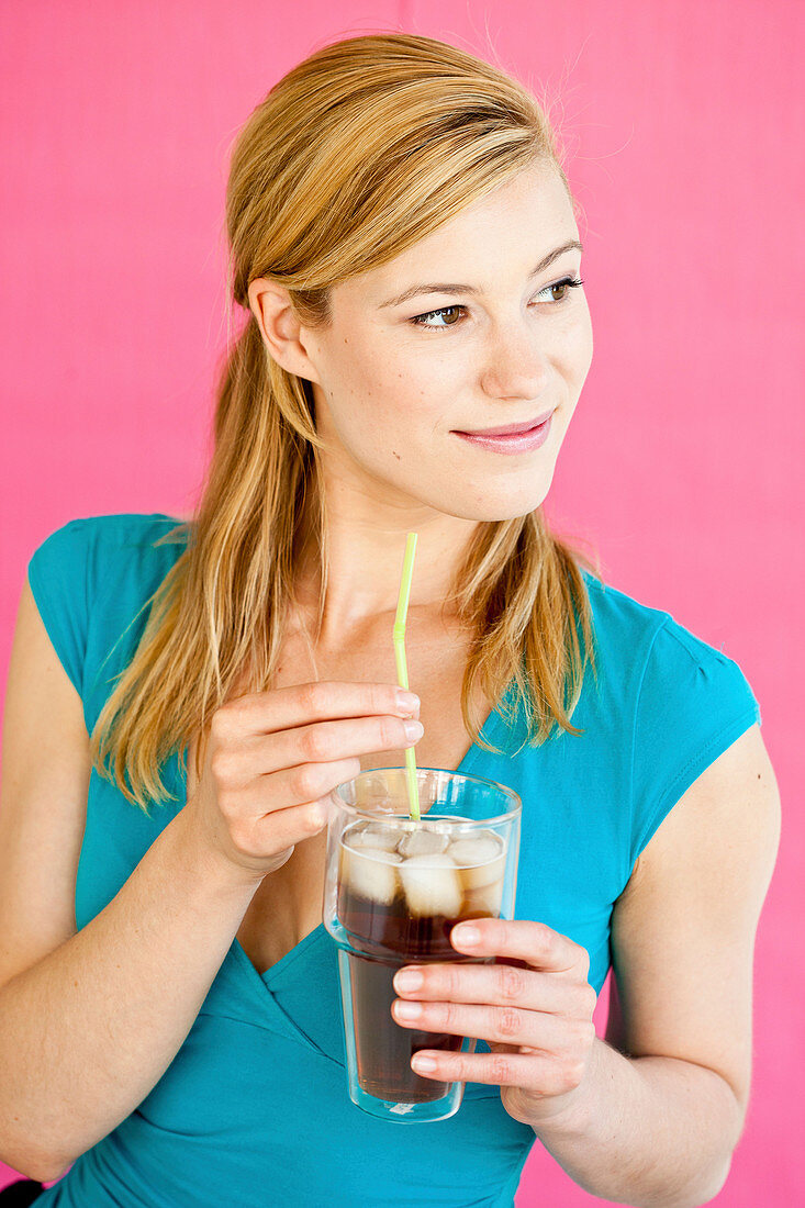 Woman drinking a cold drink