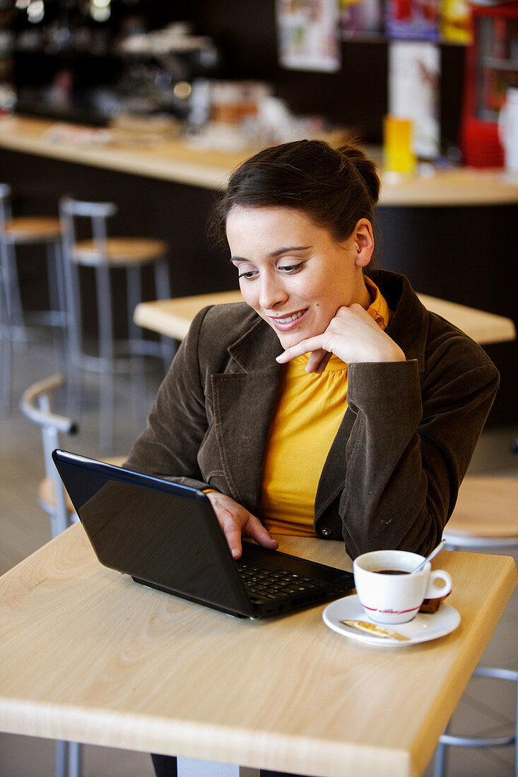 Woman using a netbook