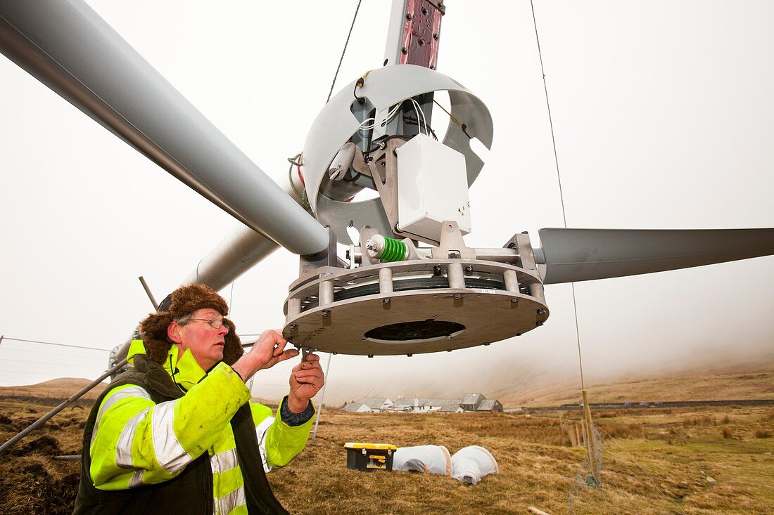 Three wind turbines being constructed
