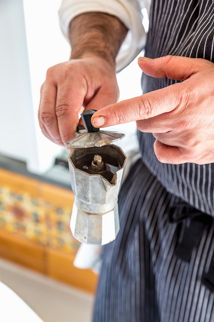 A man with an espresso maker, Italy