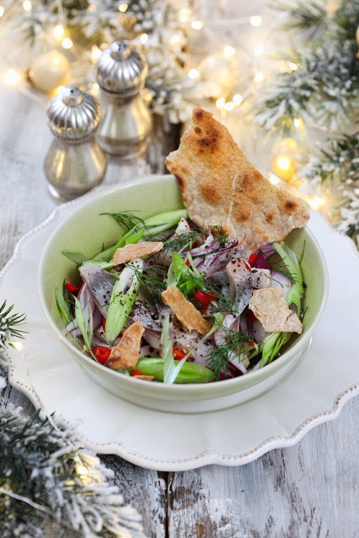 Herring salad with spring onions for Christmas