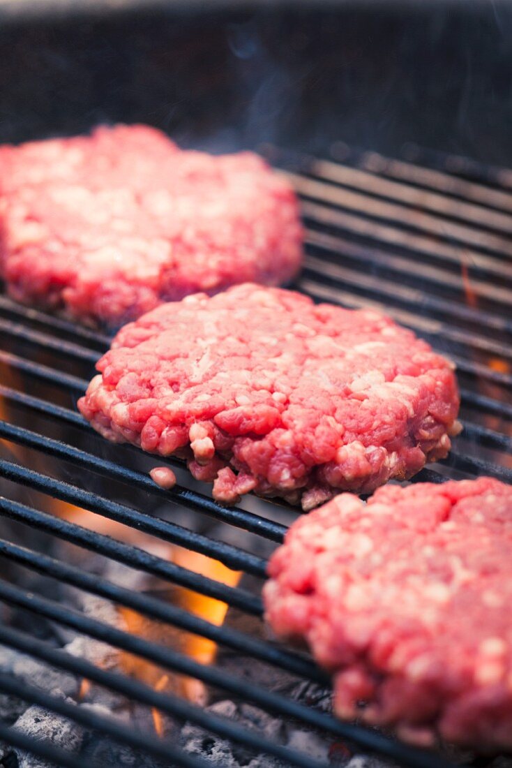 A hamburger on a grill