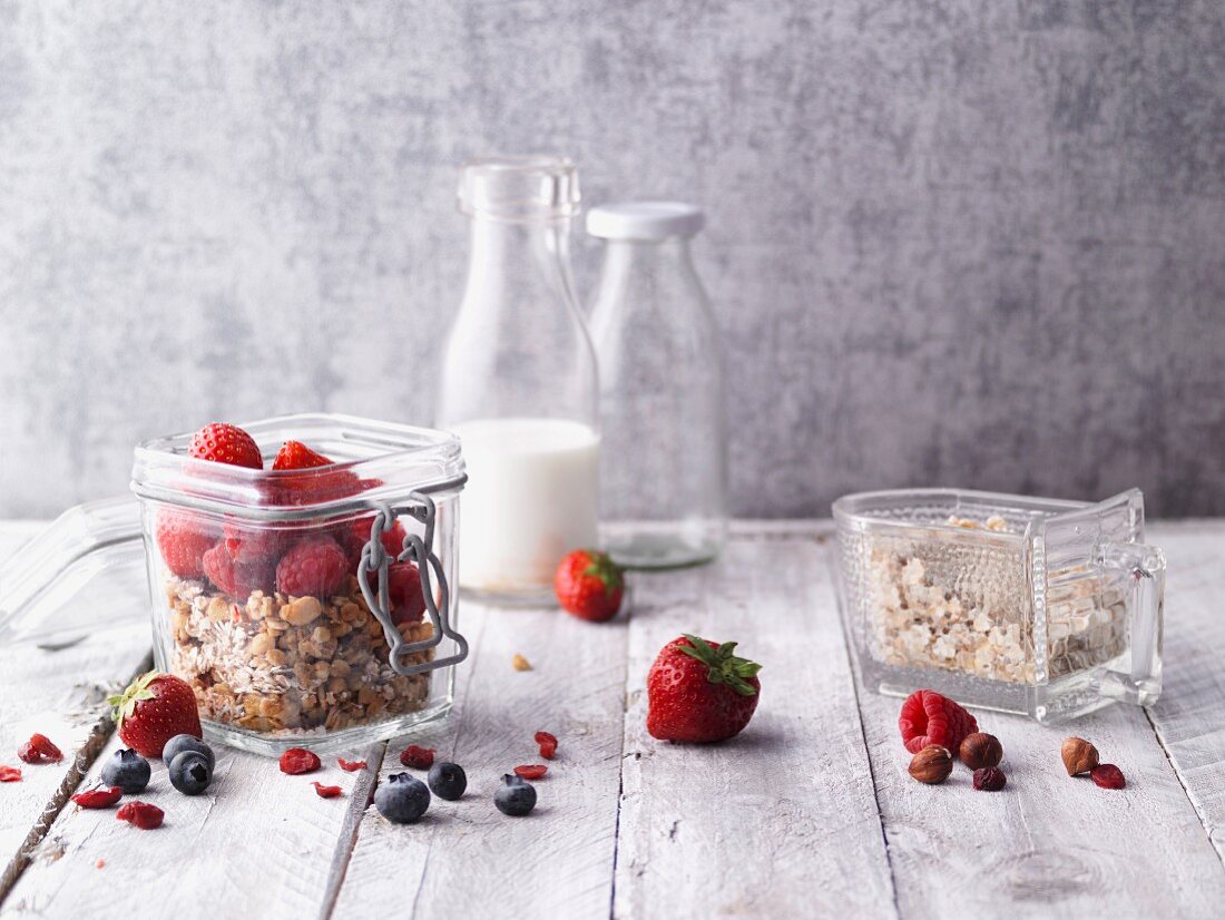 Mixed muesli with berries in a jar