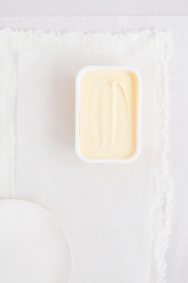 A plastic tub of margarine