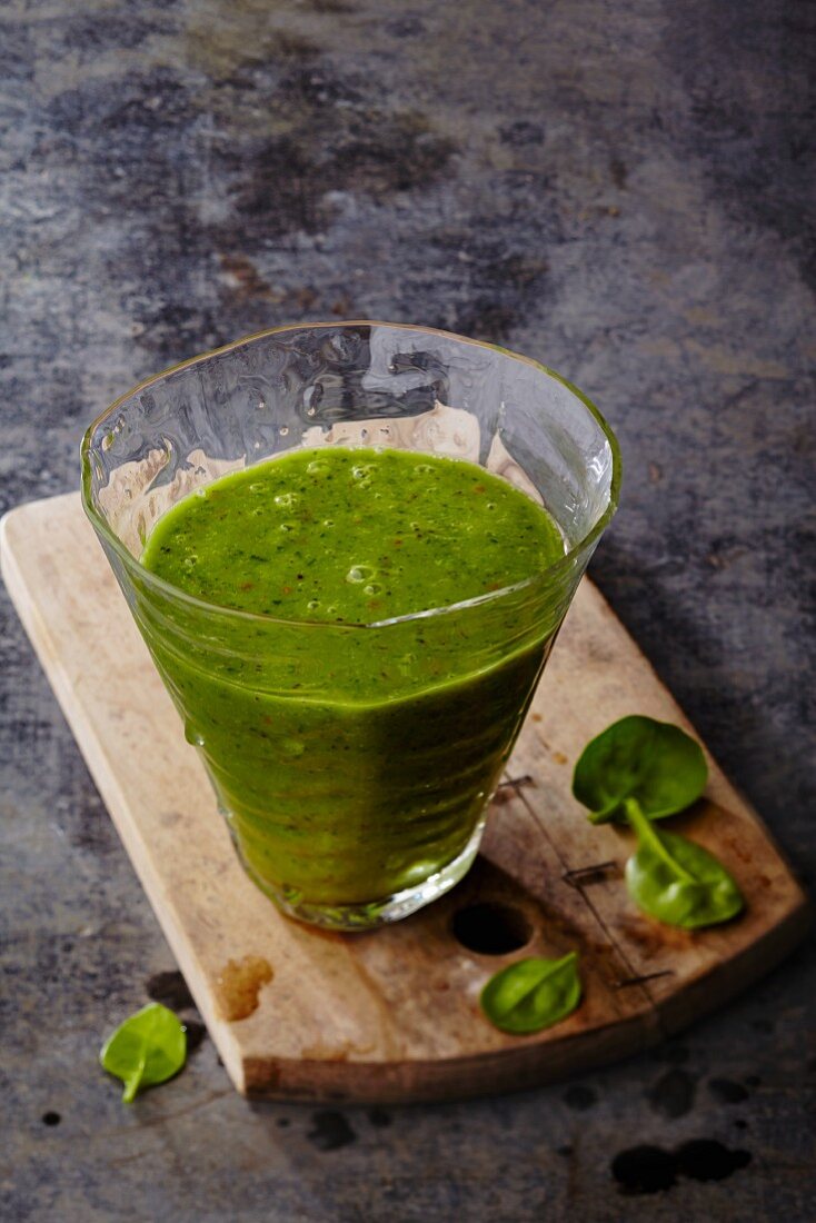 A green smoothie with spinach and avocado