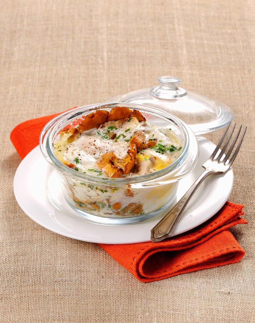 Oeufs cocotte with chanterelle mushrooms