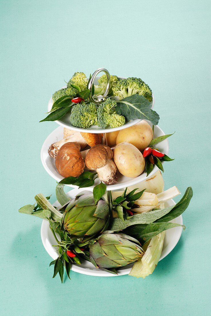 Various vegetables on a cake stand