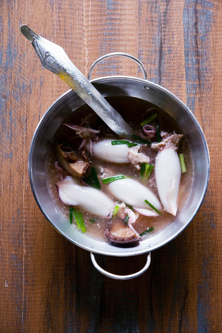 Soup Pla Mük Yat Sai (soup with stuffed squid and mushrooms, Thailand)