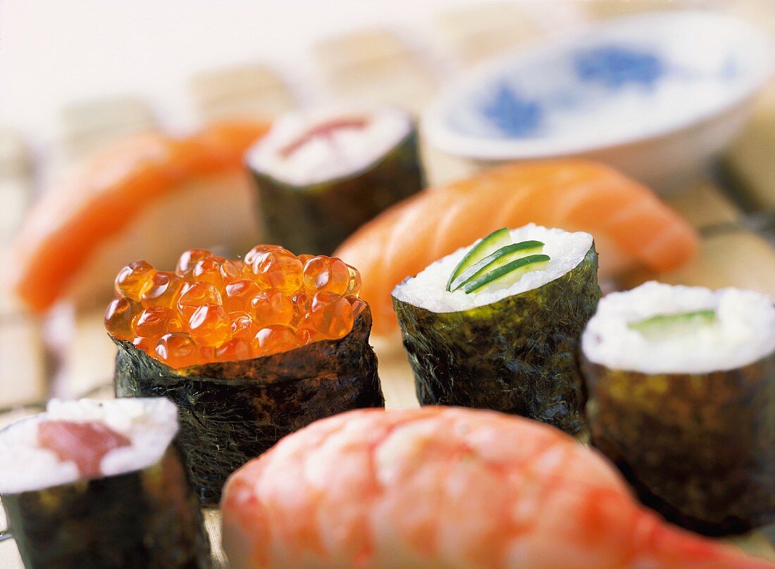 Various types of sushi and maki (close-up)