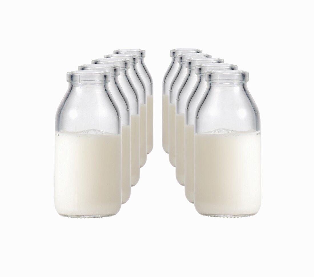 Two rows of milk bottles
