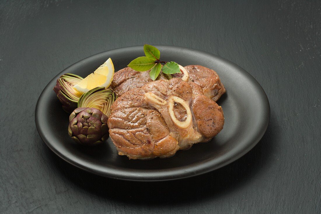 Knuckle of veal with artichokes