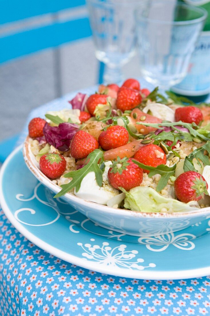 Couscous salad with strawberries and smoked salmon