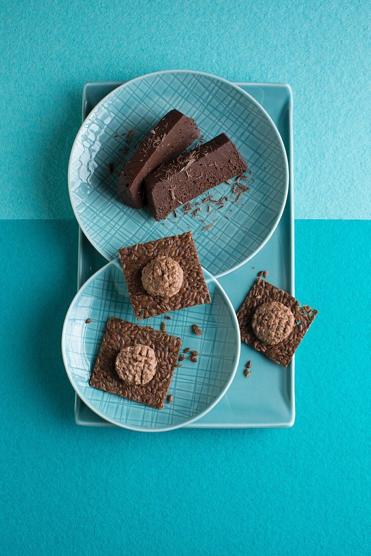 Chocolate terrine and flaxseed slices with almond and chocolate ricotta