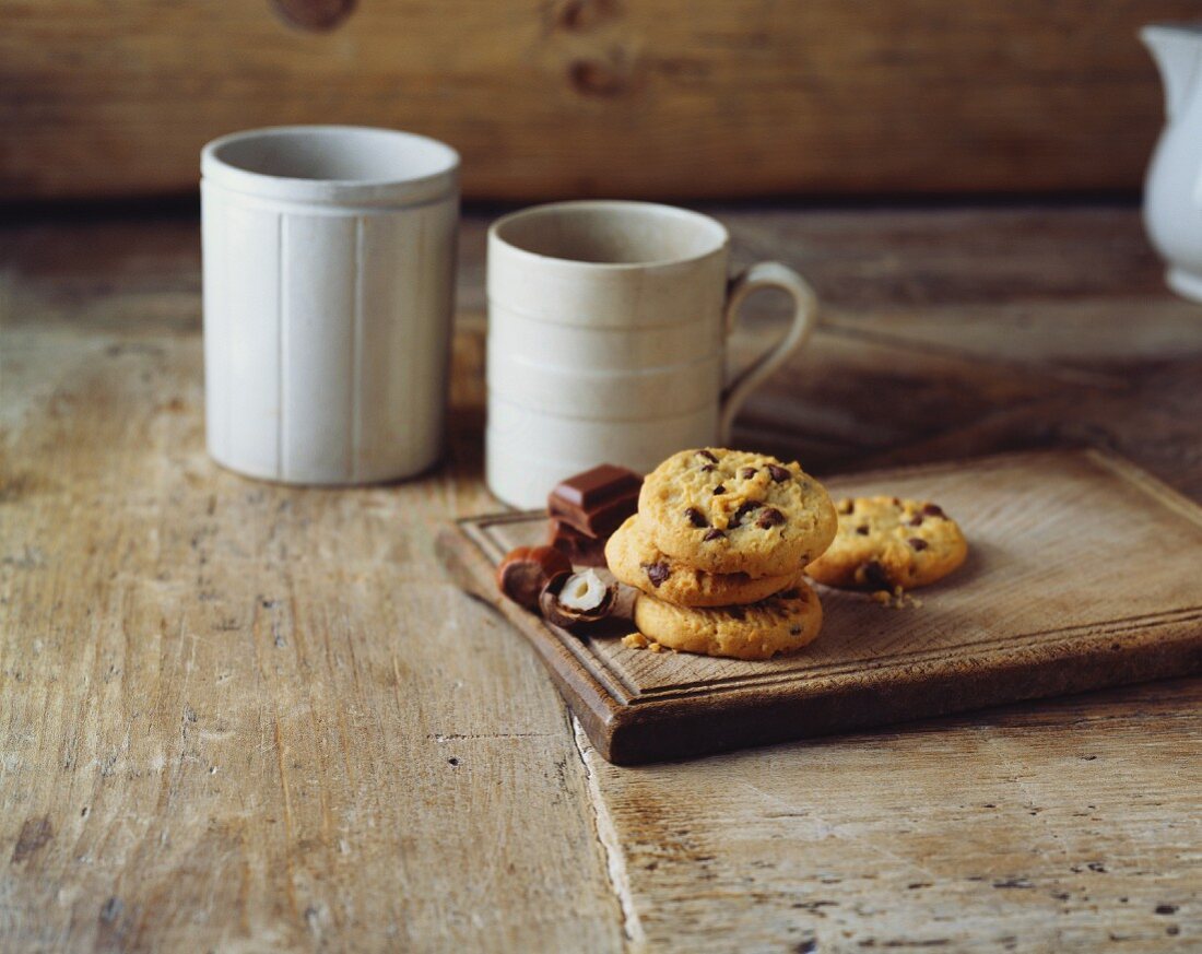 Chocolate and hazelnut cookies on an old wooden tray