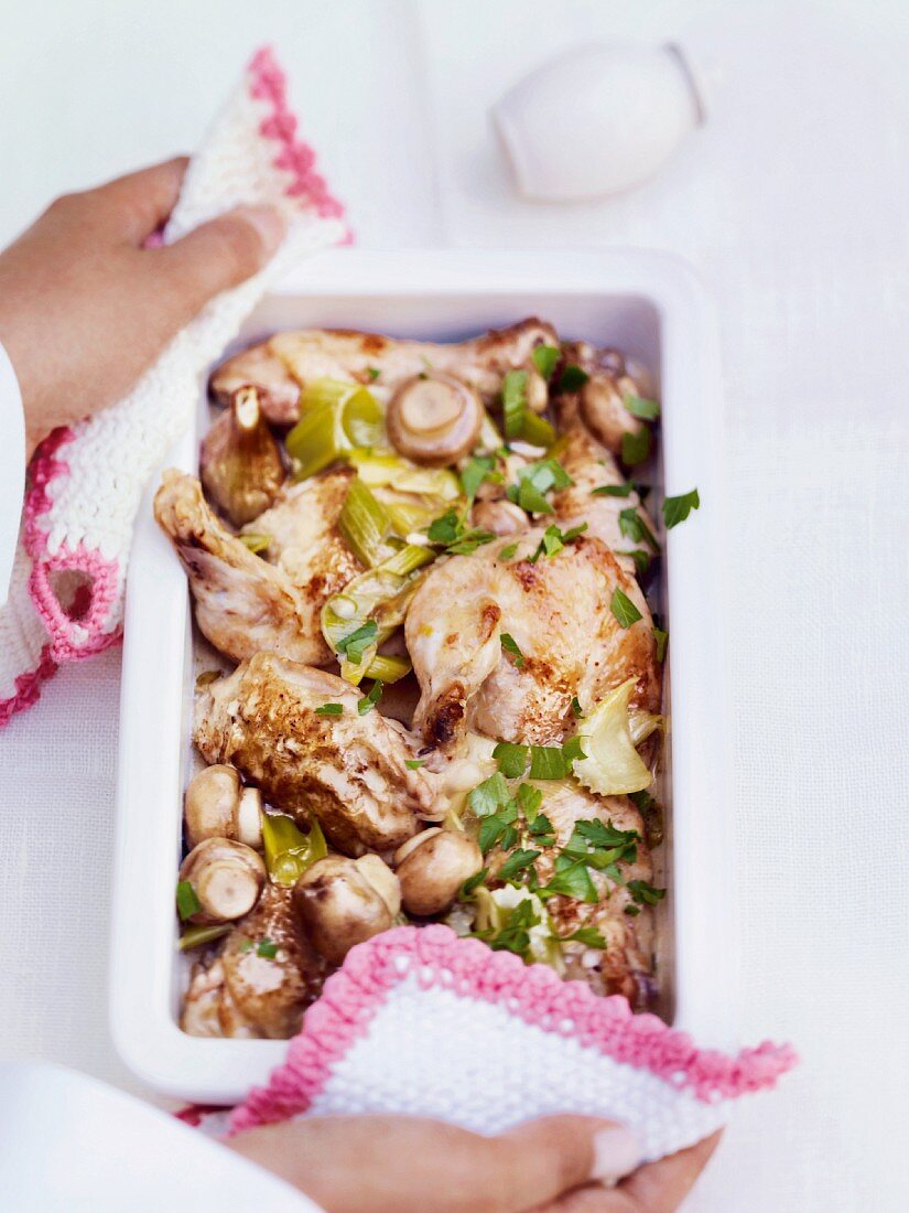 Roast chicken legs with mushrooms and celery