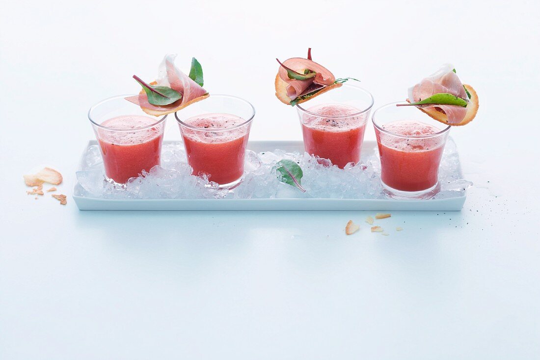 Watermelon and cucumber soup with ham and Parmesan biscuits