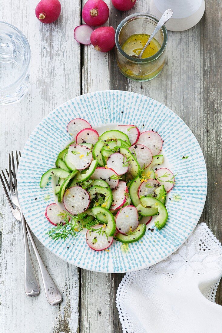 Radish and cucumber salad with deer and mustard seed, lemon and olive oil dressing