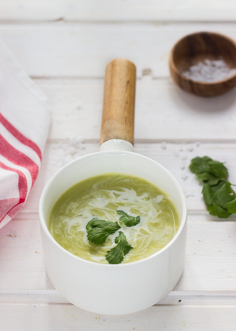 Coriander soup in a saucepan