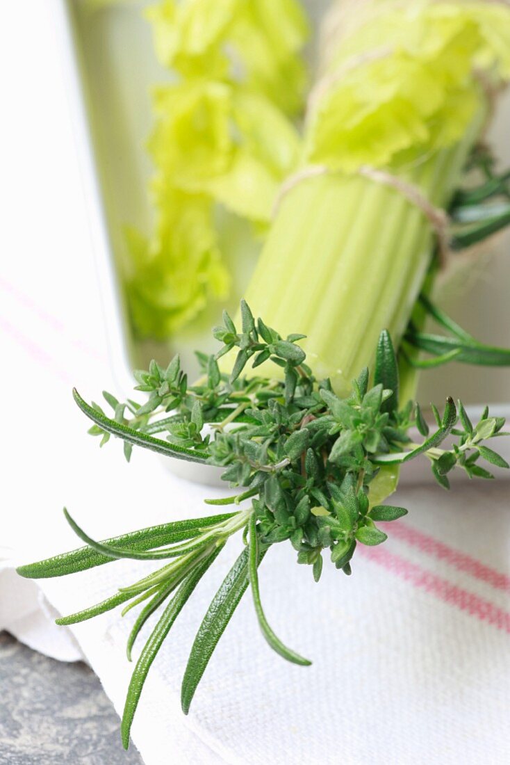 Bouquet garni with celery, thyme and rosemary (close-up)