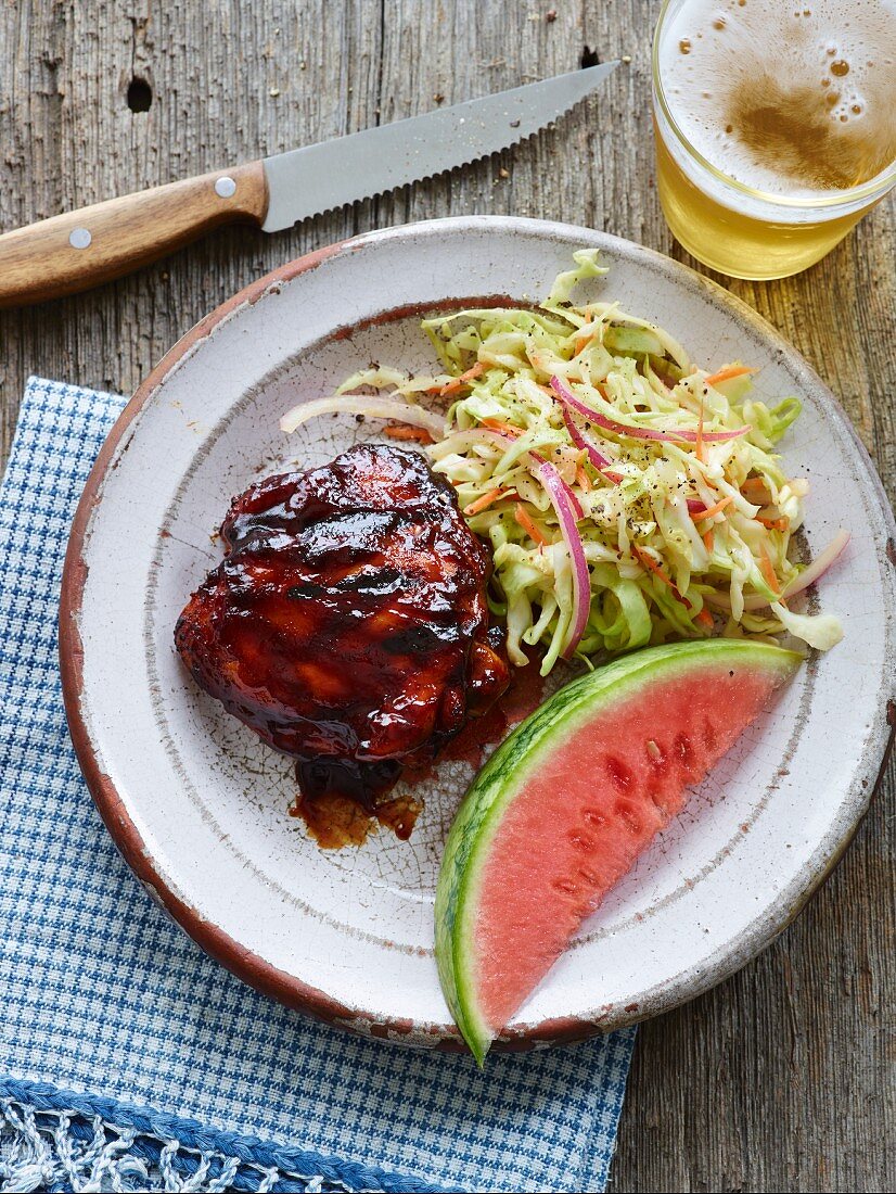 Grilled chicken with coleslaw and watermelon