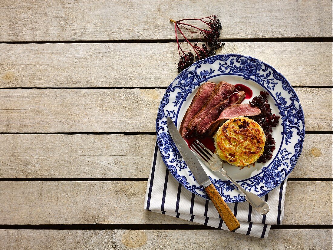 Venison with leek and potato fritters