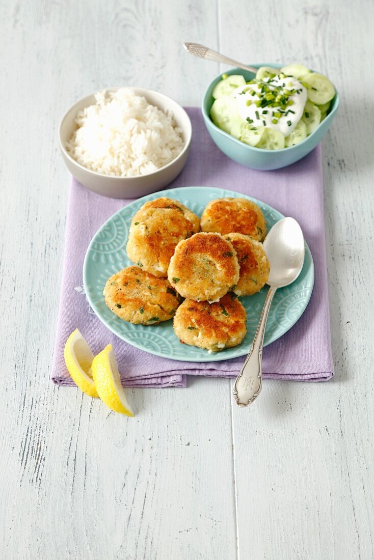 Bread fritters with rice and a cucumber salad