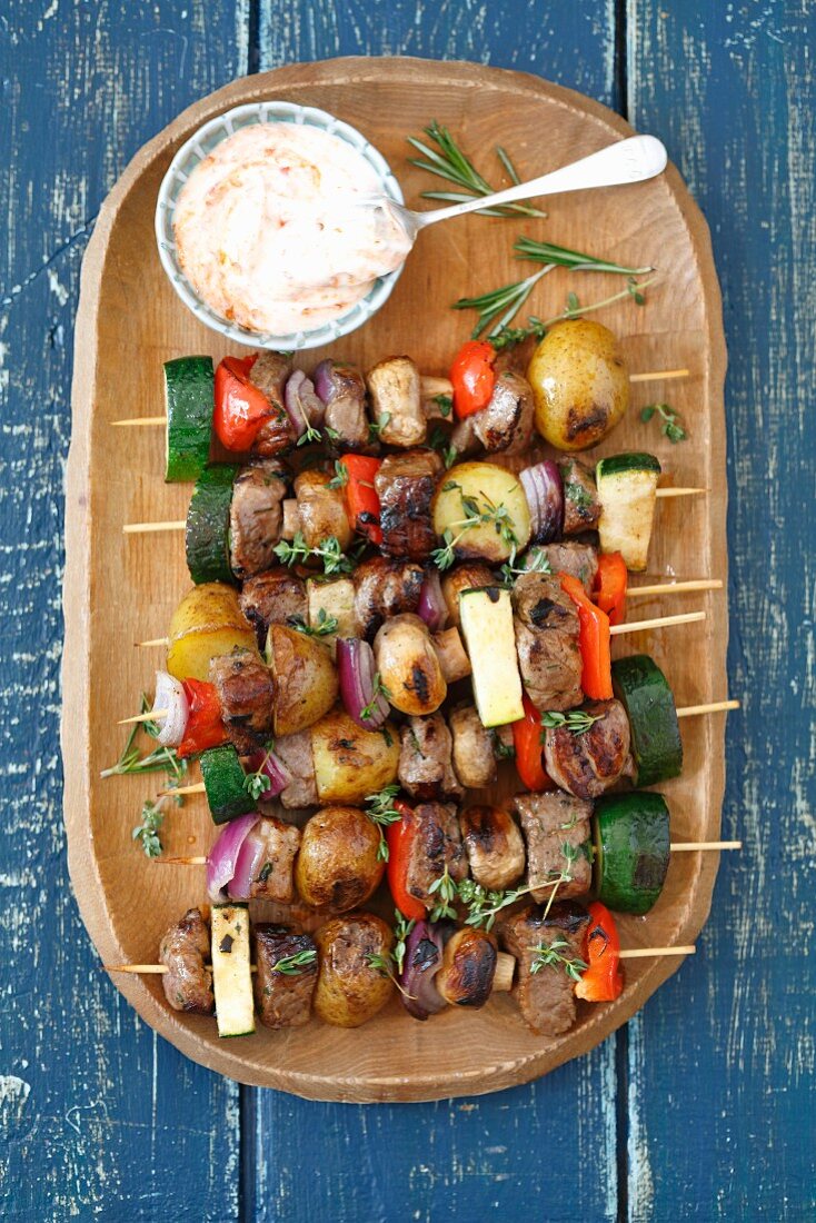 Pork and vegetable kebabs with a spicy dipping sauce