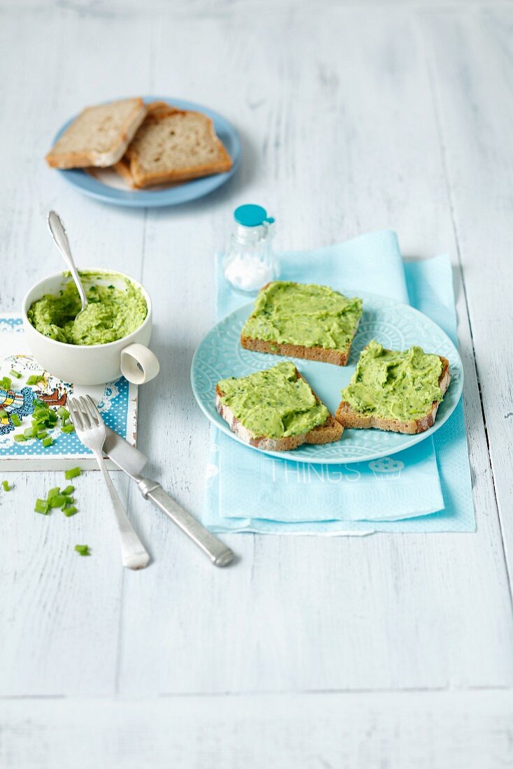 Pea and avocado cream on bread