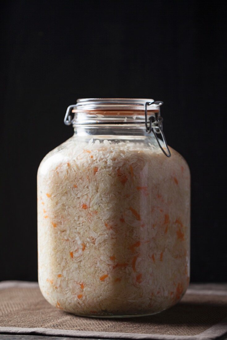 Sauerkraut with carrots in a jar