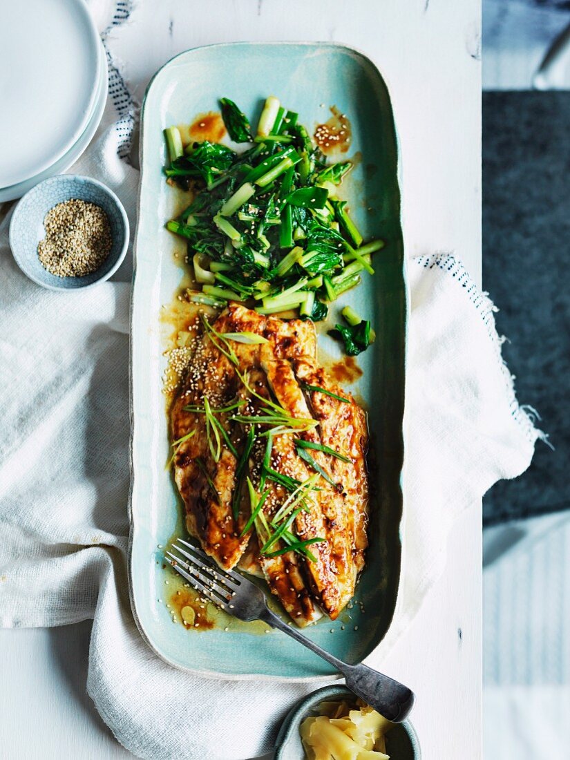 Miso roast mulloway with sesame and sauteed greens