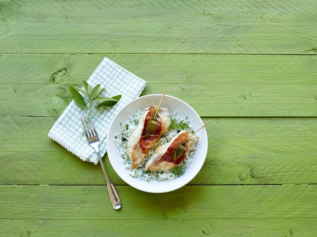 Fish saltimbocca with herb rice