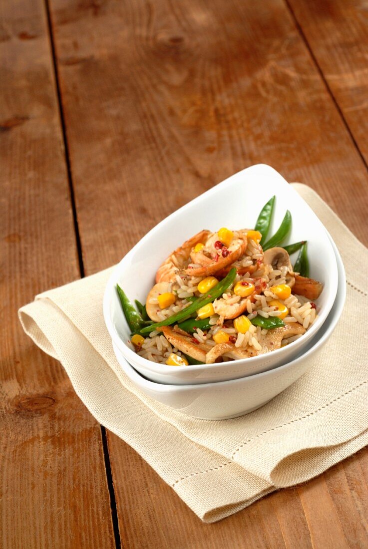 Fried Thai rice with prawns, mange tout and sweetcorn