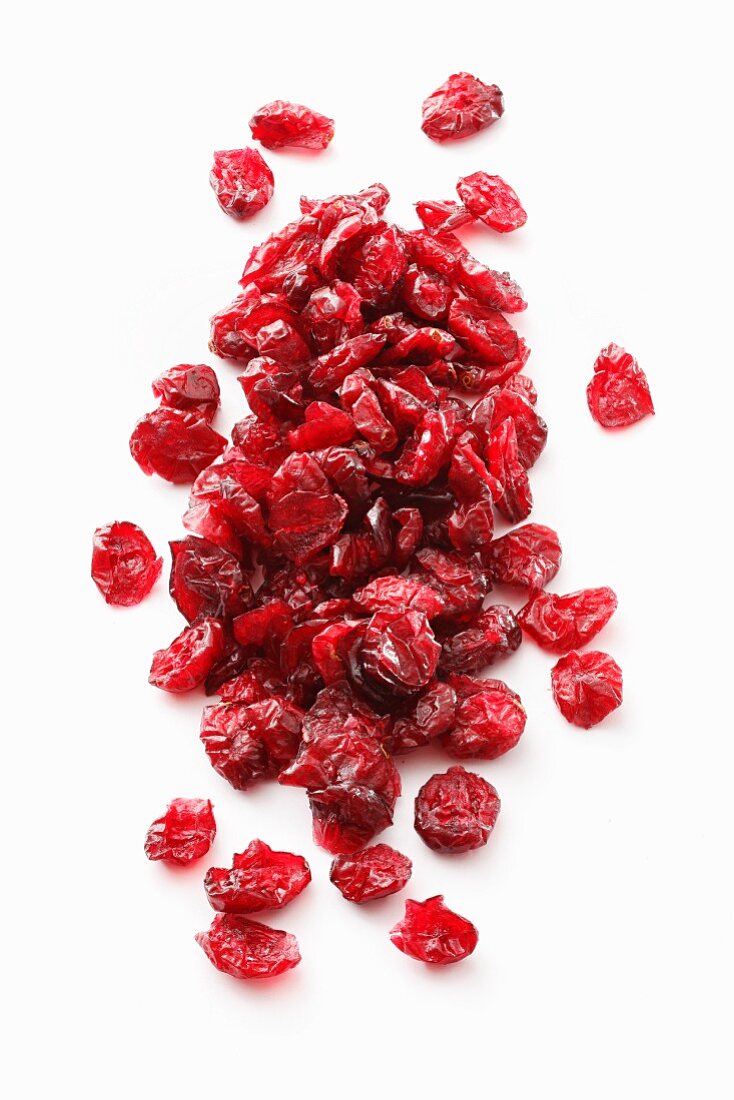 Dried cranberries on a white surface