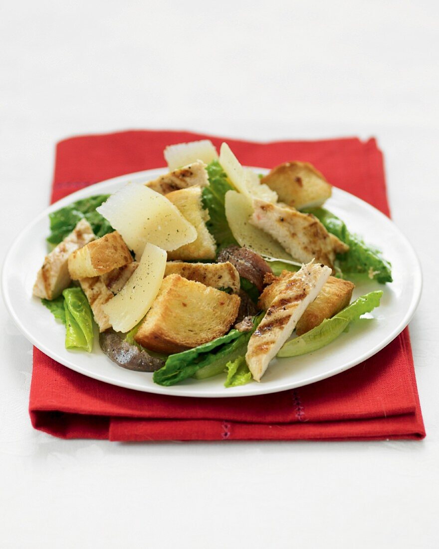 Caesar salad with grilled chicken, croutons and Parmesan cheese
