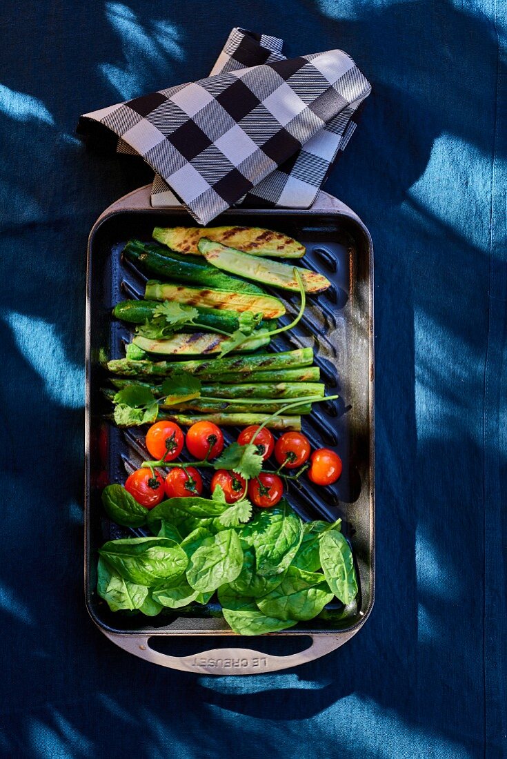 Grilled vegetables on a blue table
