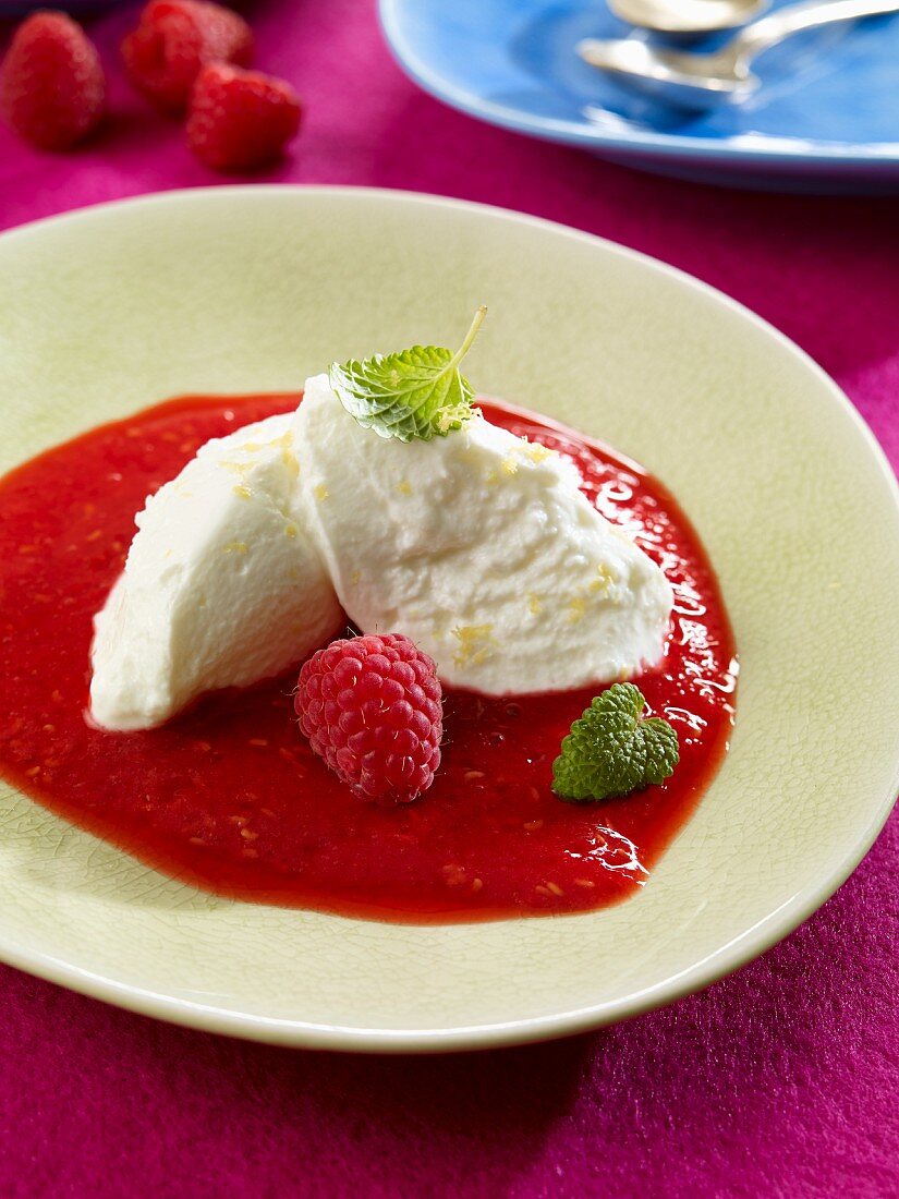 Lemon and quark mousse with raspberry sauce