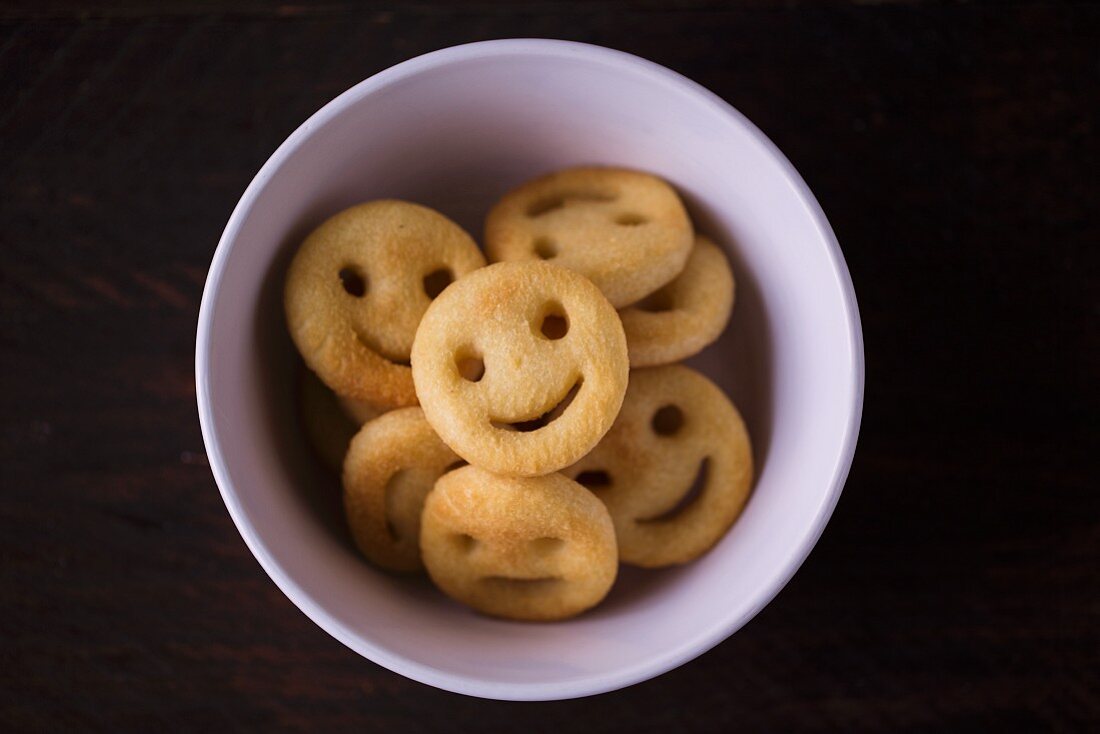 Potato smileys in a light bowl