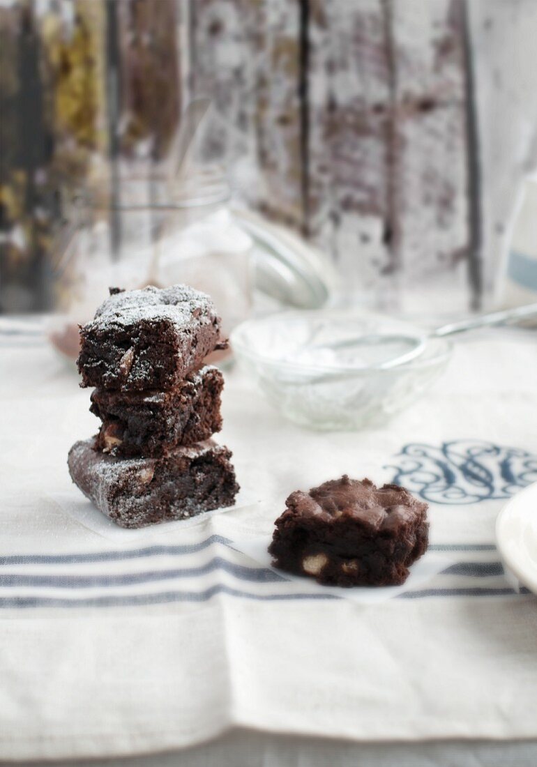 Chocolate brownies with nuts and icing sugar