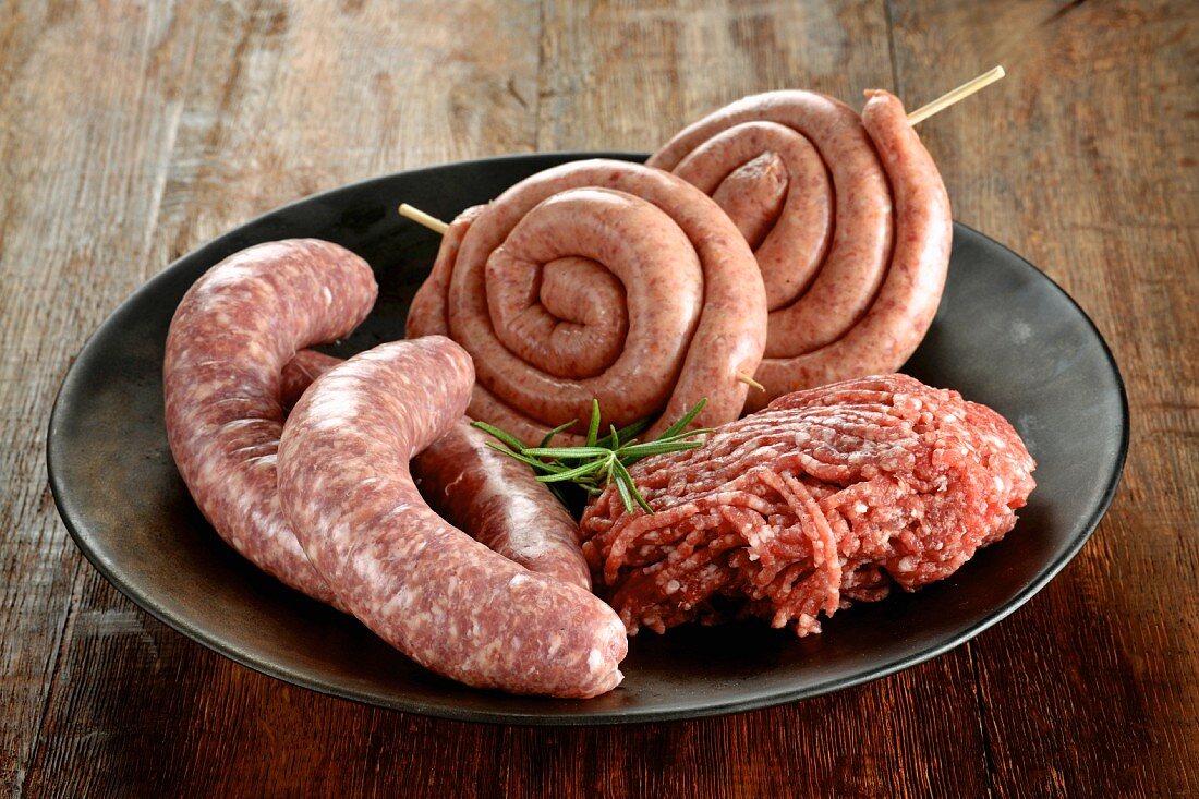 Raw minced beef and sausages