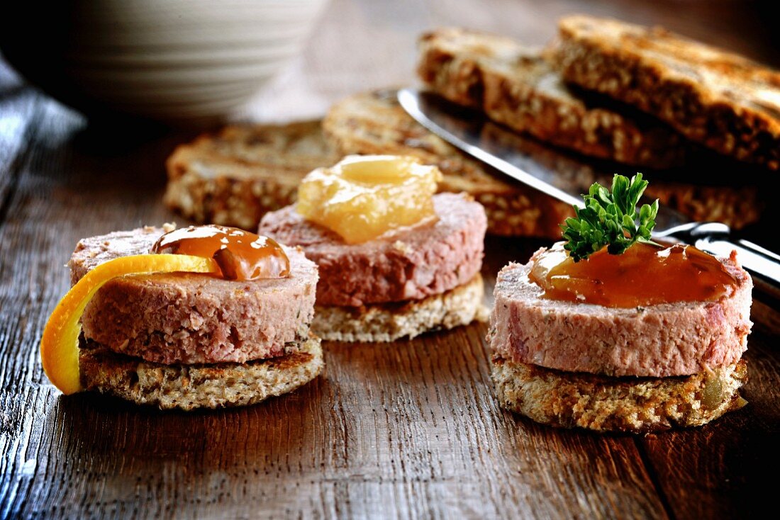 Toast topped with duck pâté and jam