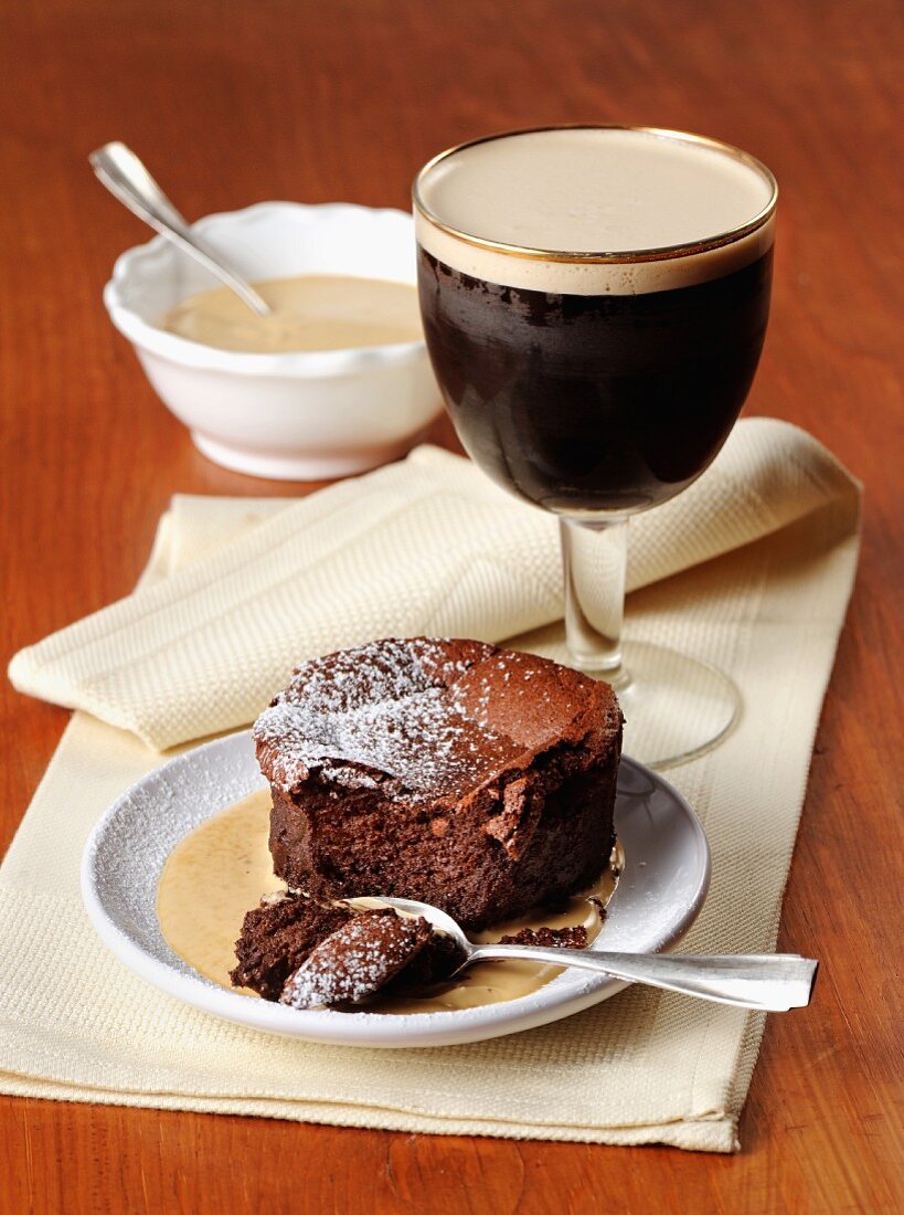 Chocolate cake with vanilla sauce and Irish coffee