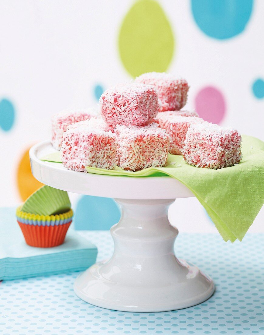 Strawberry bites covered with grated coconut