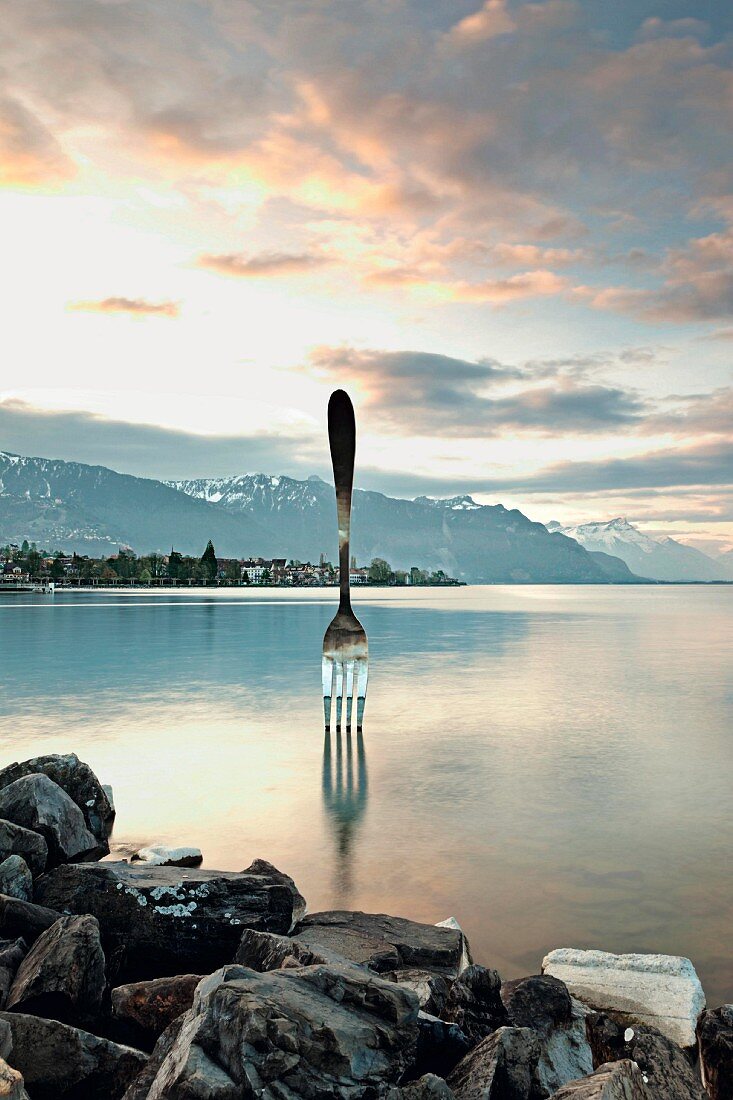 A fork in Lake Geneva in Vevey, a sculpture by the Swiss artist Jean-Pierre Zaugg, Switzerland
