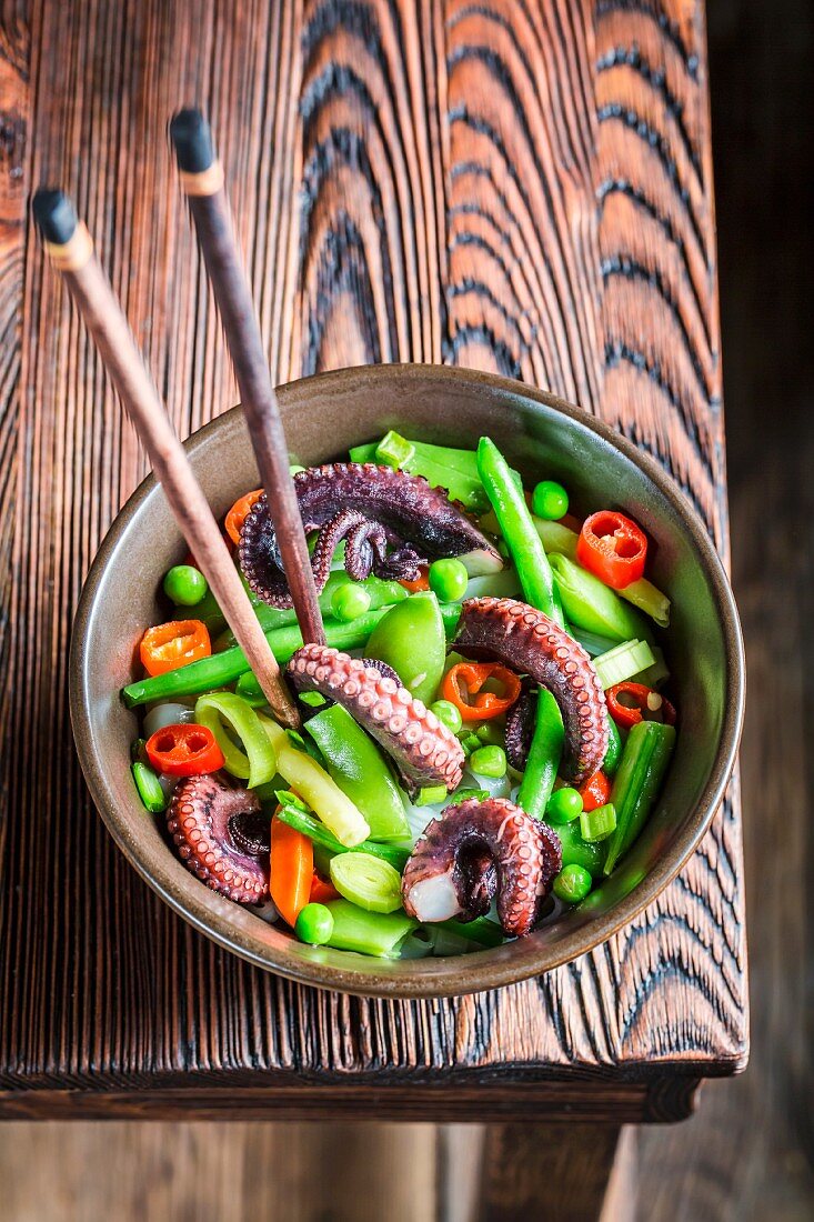 Vegetables with noodles and octopus (Asia)