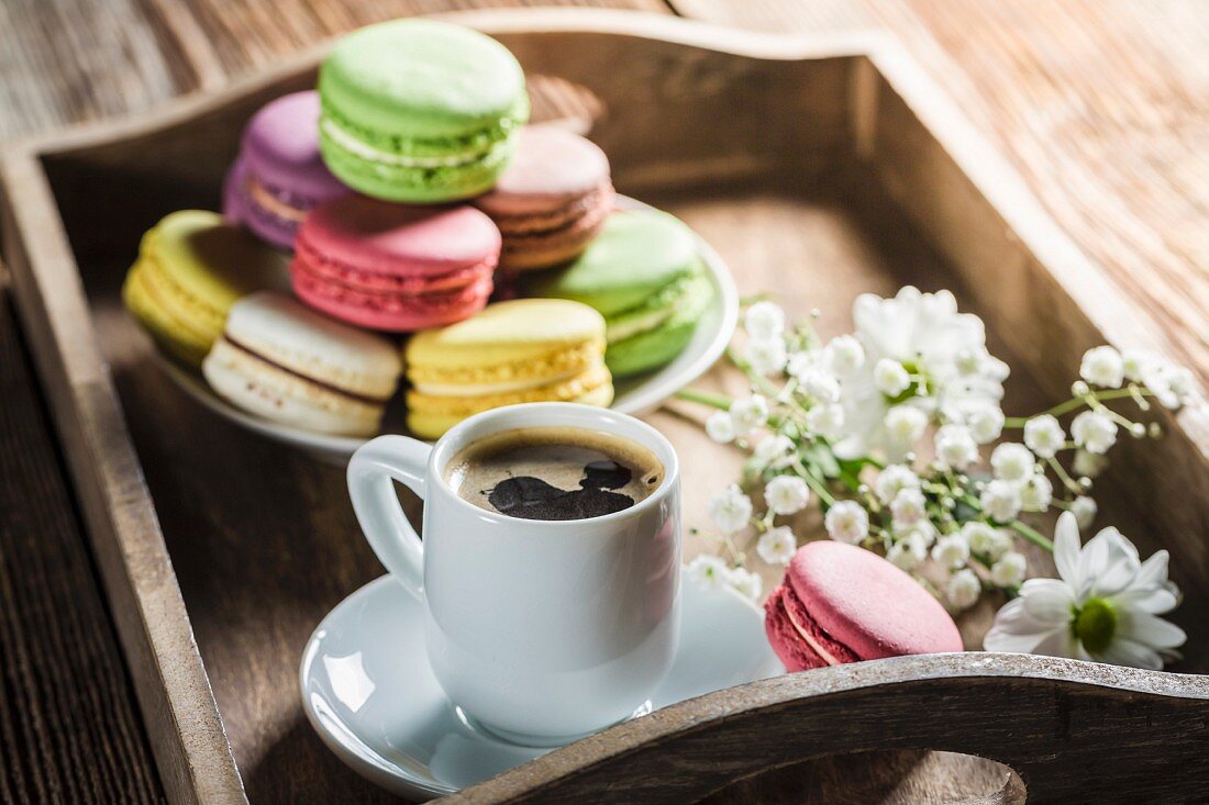 Coffee with colorful macaroons