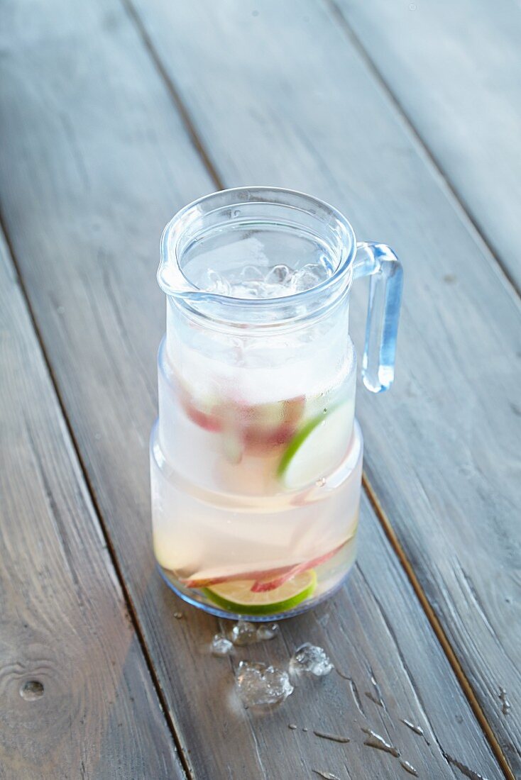 Ginger and rhubarb water with ice cubes