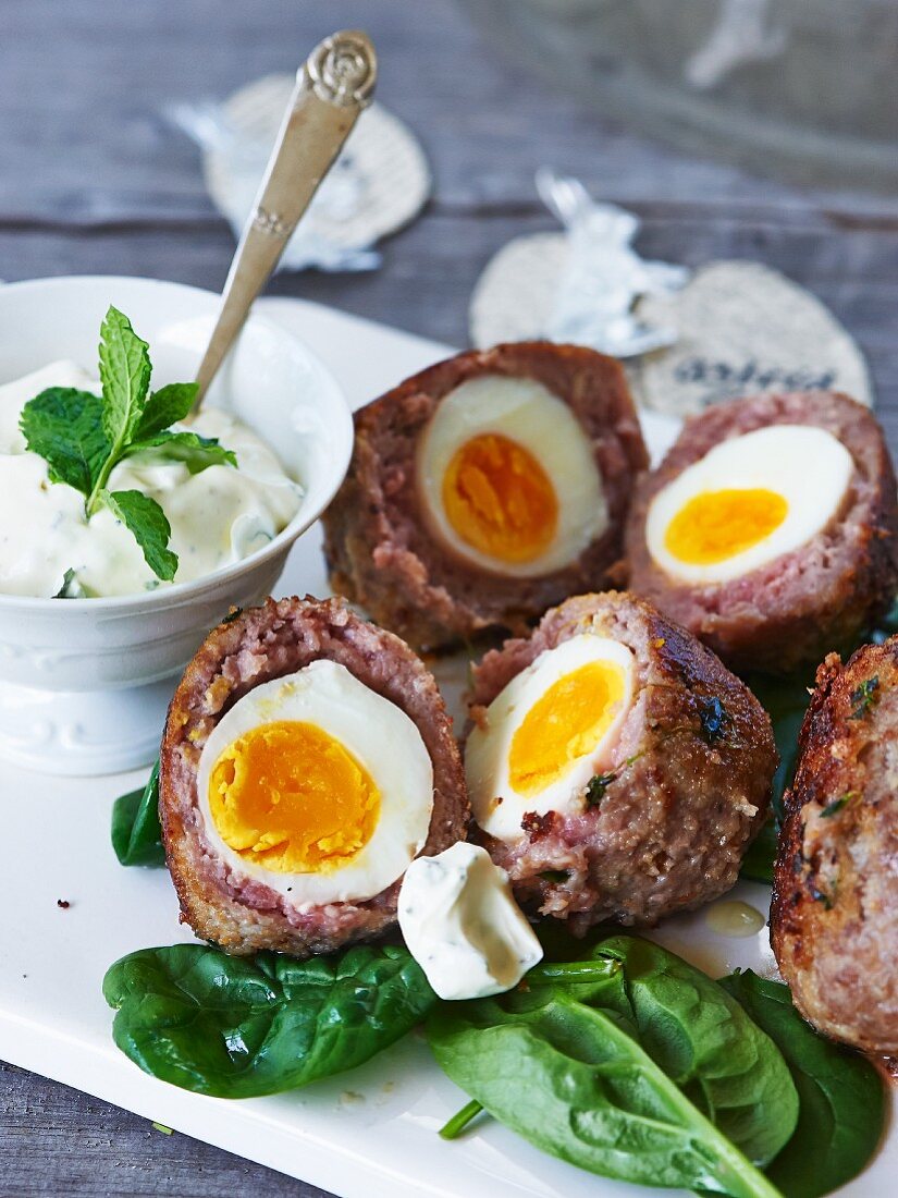 Baked eggs coated in mince for Easter